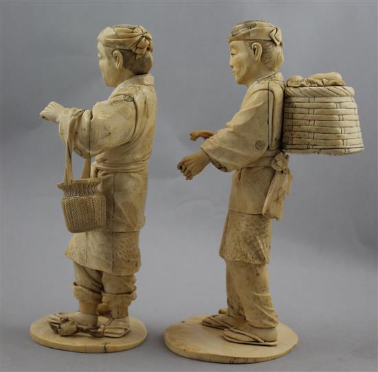 A pair of Japanese bone and ivory sectional figures of fruit pickers, early 20th century, 21cm and 22cm, losses